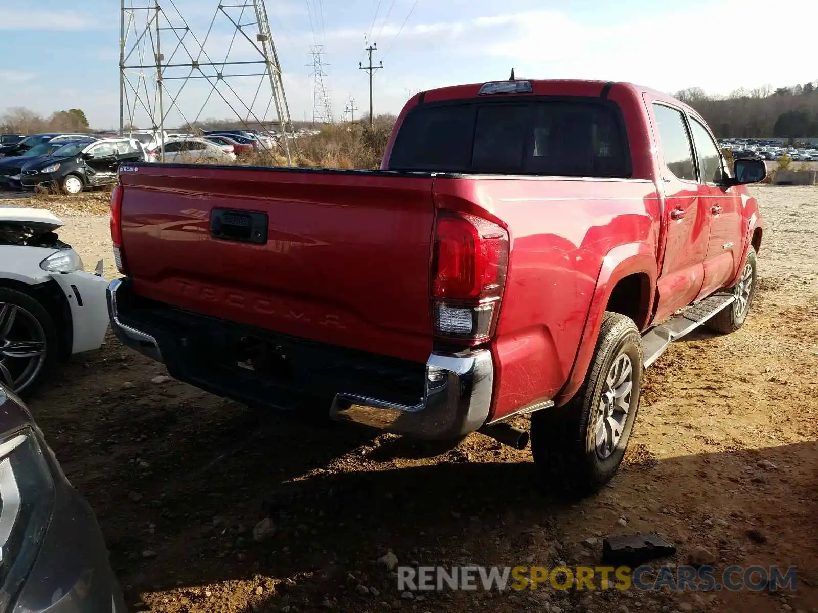 4 Photograph of a damaged car 5TFAX5GN4KX153215 TOYOTA TACOMA 2019