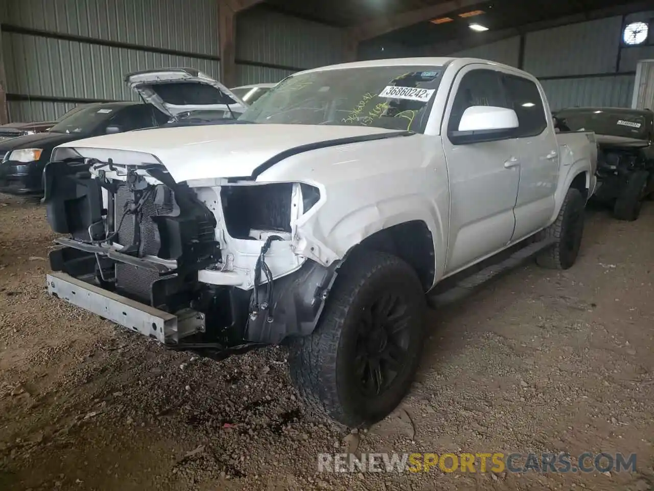 2 Photograph of a damaged car 5TFAX5GN4KX157409 TOYOTA TACOMA 2019