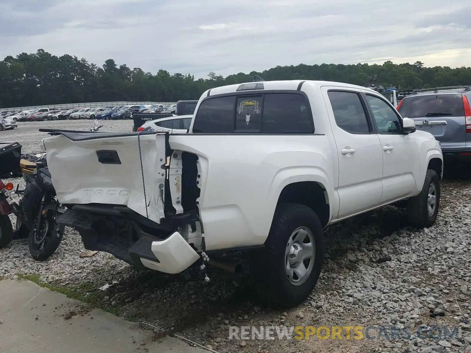 4 Photograph of a damaged car 5TFAX5GN4KX157457 TOYOTA TACOMA 2019