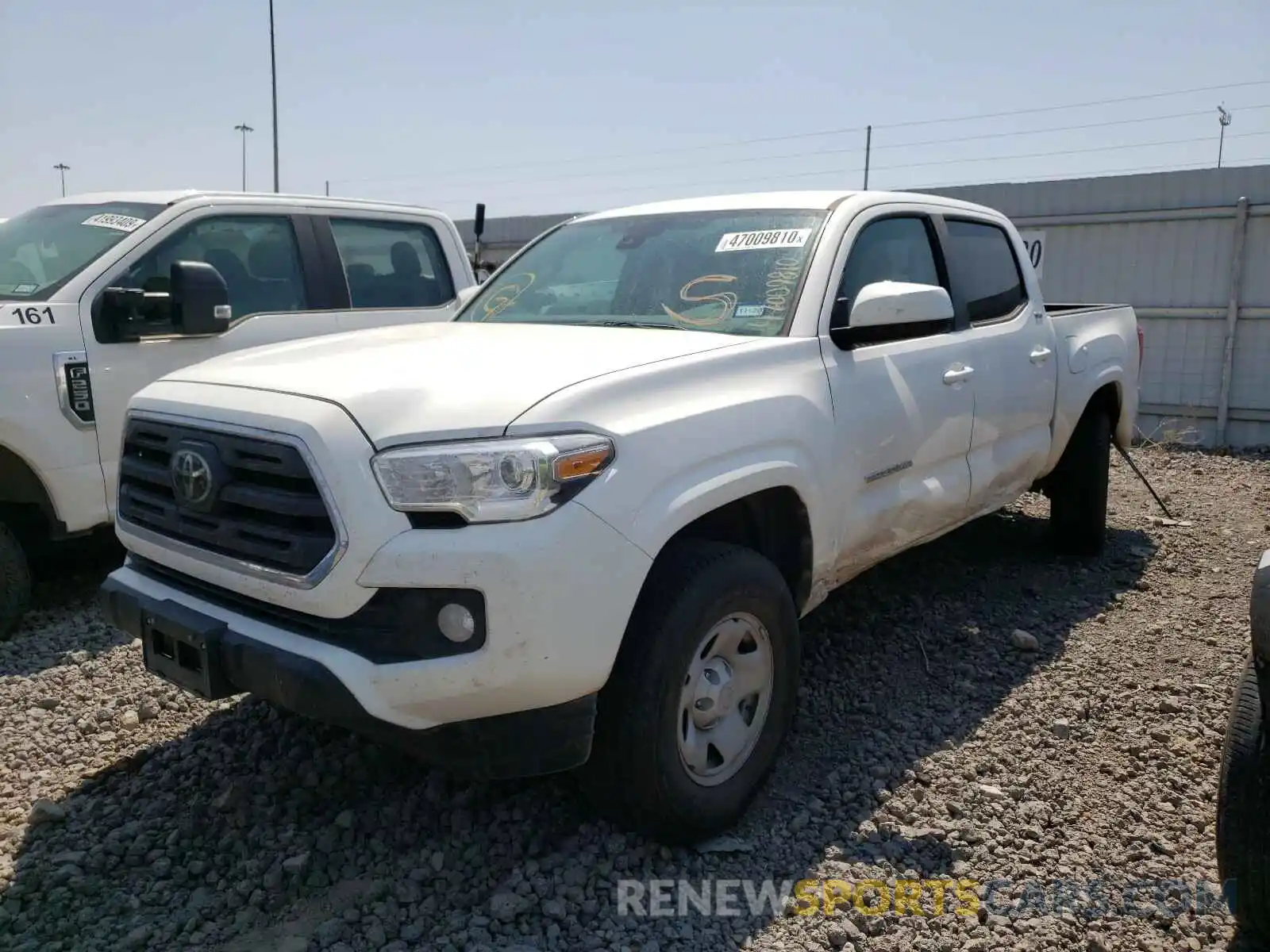 2 Photograph of a damaged car 5TFAX5GN4KX163212 TOYOTA TACOMA 2019