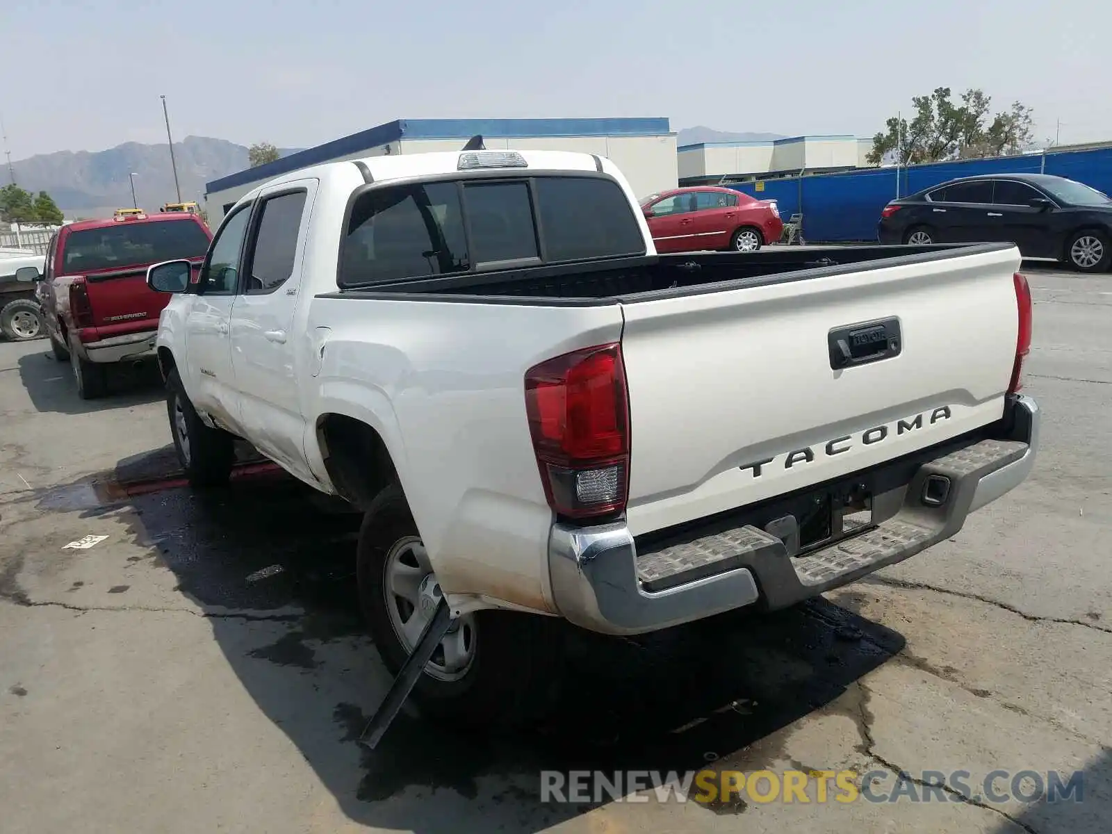 3 Photograph of a damaged car 5TFAX5GN4KX163212 TOYOTA TACOMA 2019