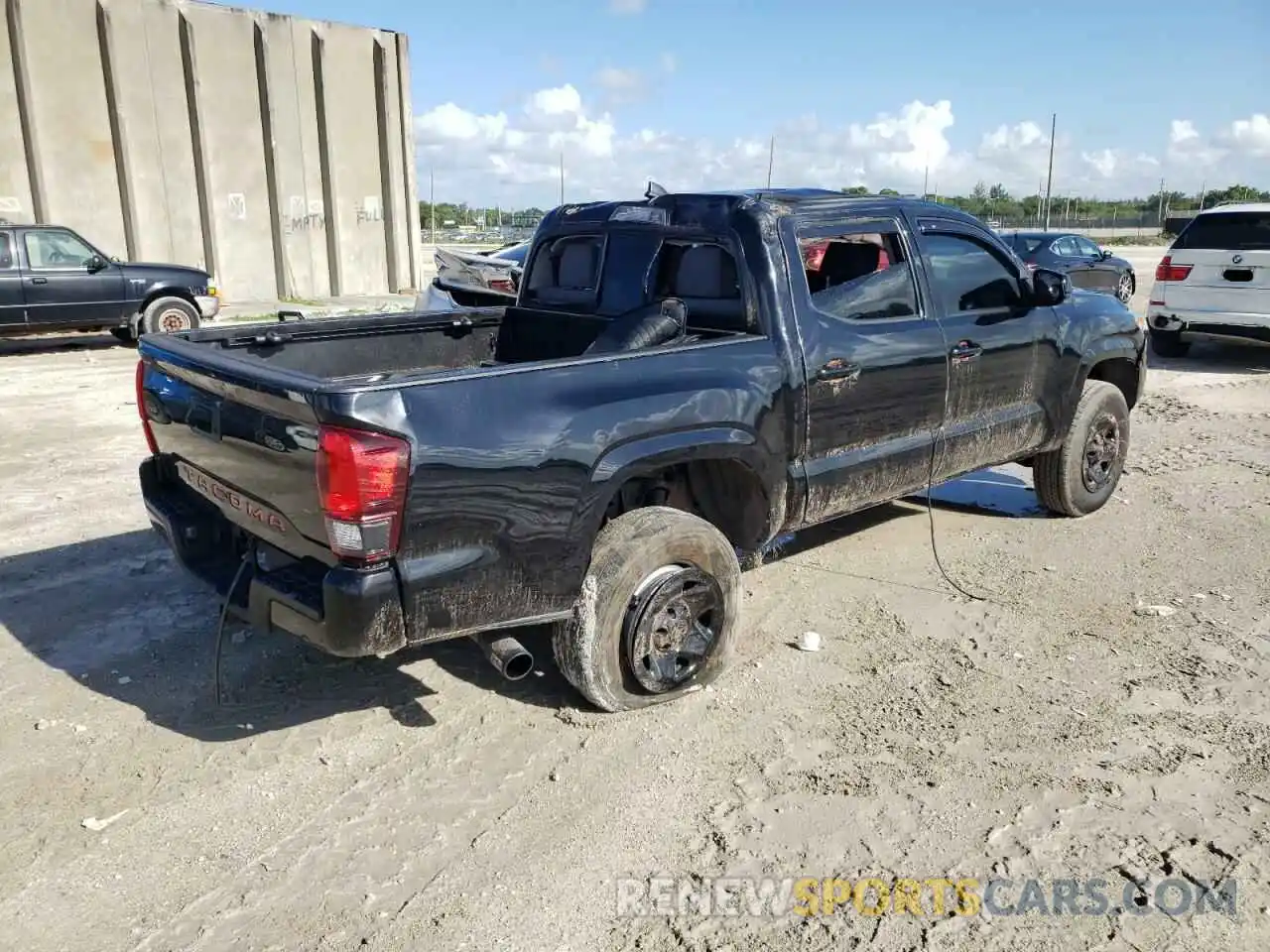 4 Photograph of a damaged car 5TFAX5GN4KX164005 TOYOTA TACOMA 2019