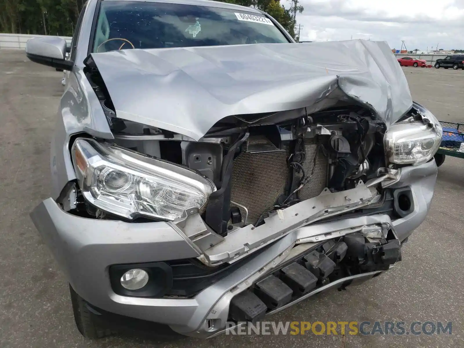 9 Photograph of a damaged car 5TFAX5GN4KX164957 TOYOTA TACOMA 2019