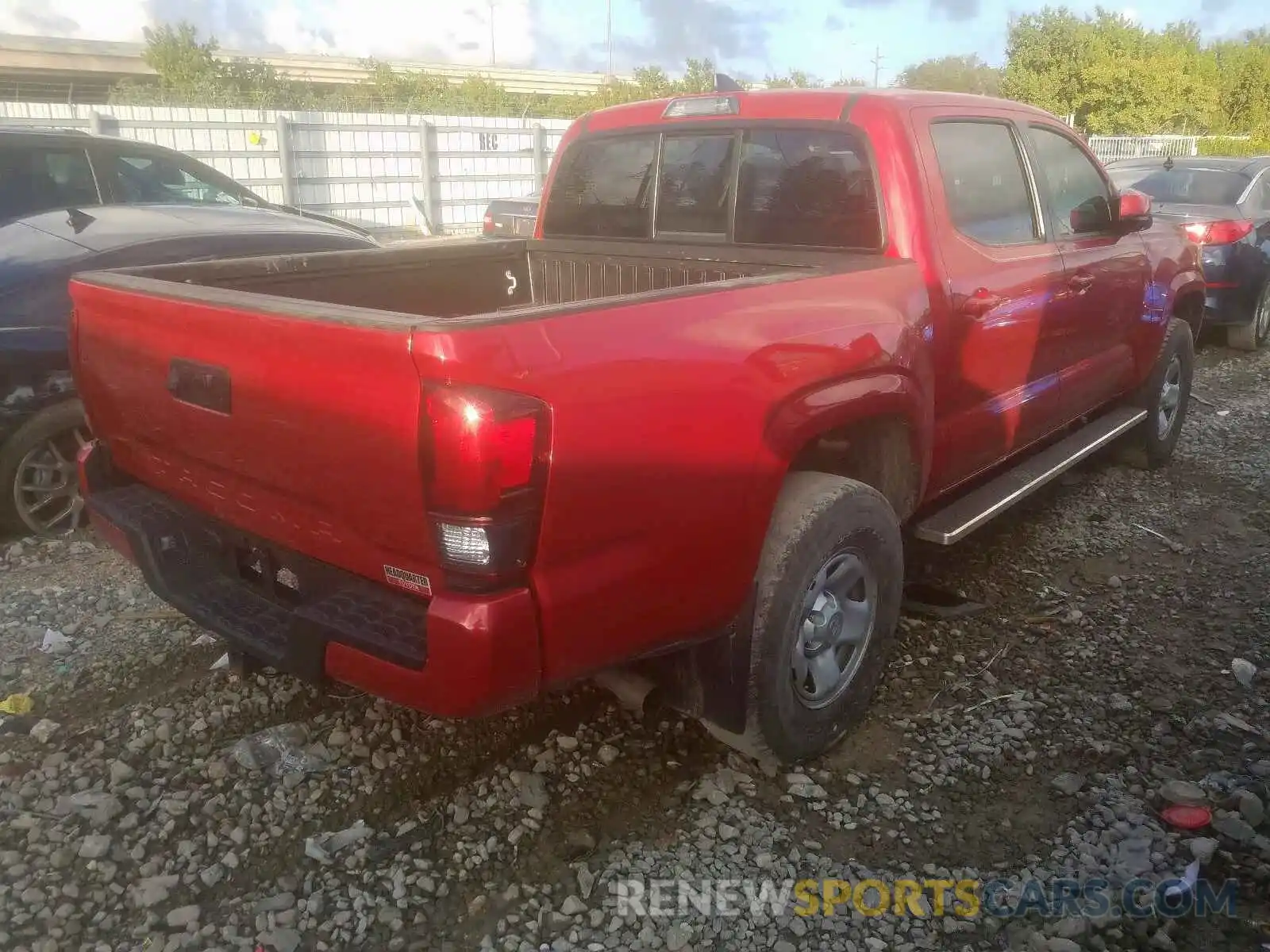 4 Photograph of a damaged car 5TFAX5GN5KX133328 TOYOTA TACOMA 2019