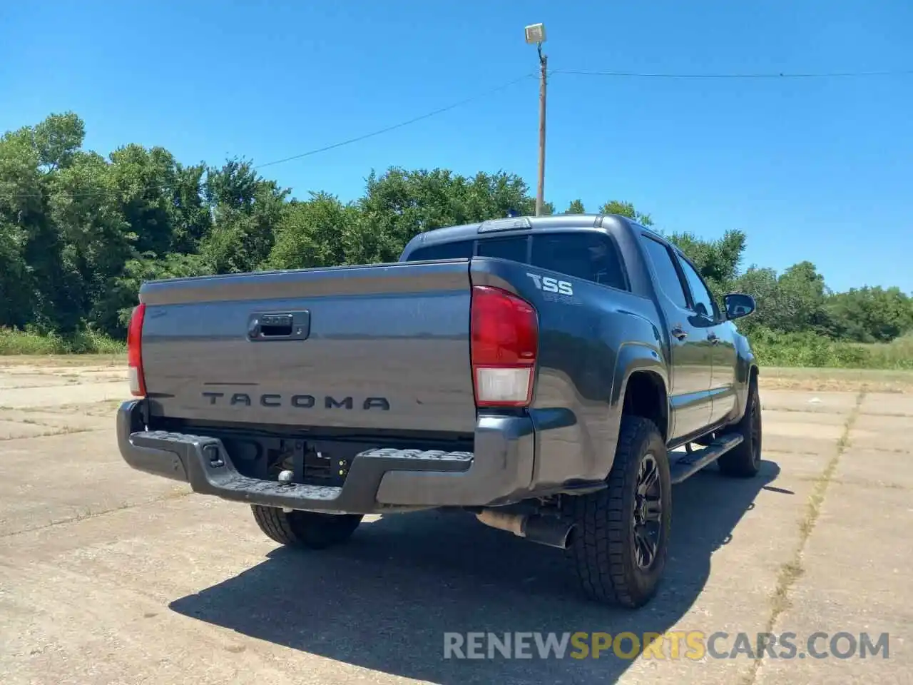 4 Photograph of a damaged car 5TFAX5GN5KX134236 TOYOTA TACOMA 2019