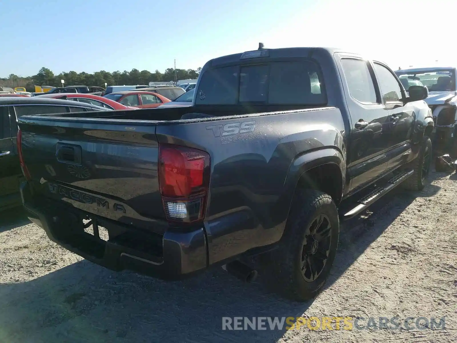 4 Photograph of a damaged car 5TFAX5GN5KX135693 TOYOTA TACOMA 2019