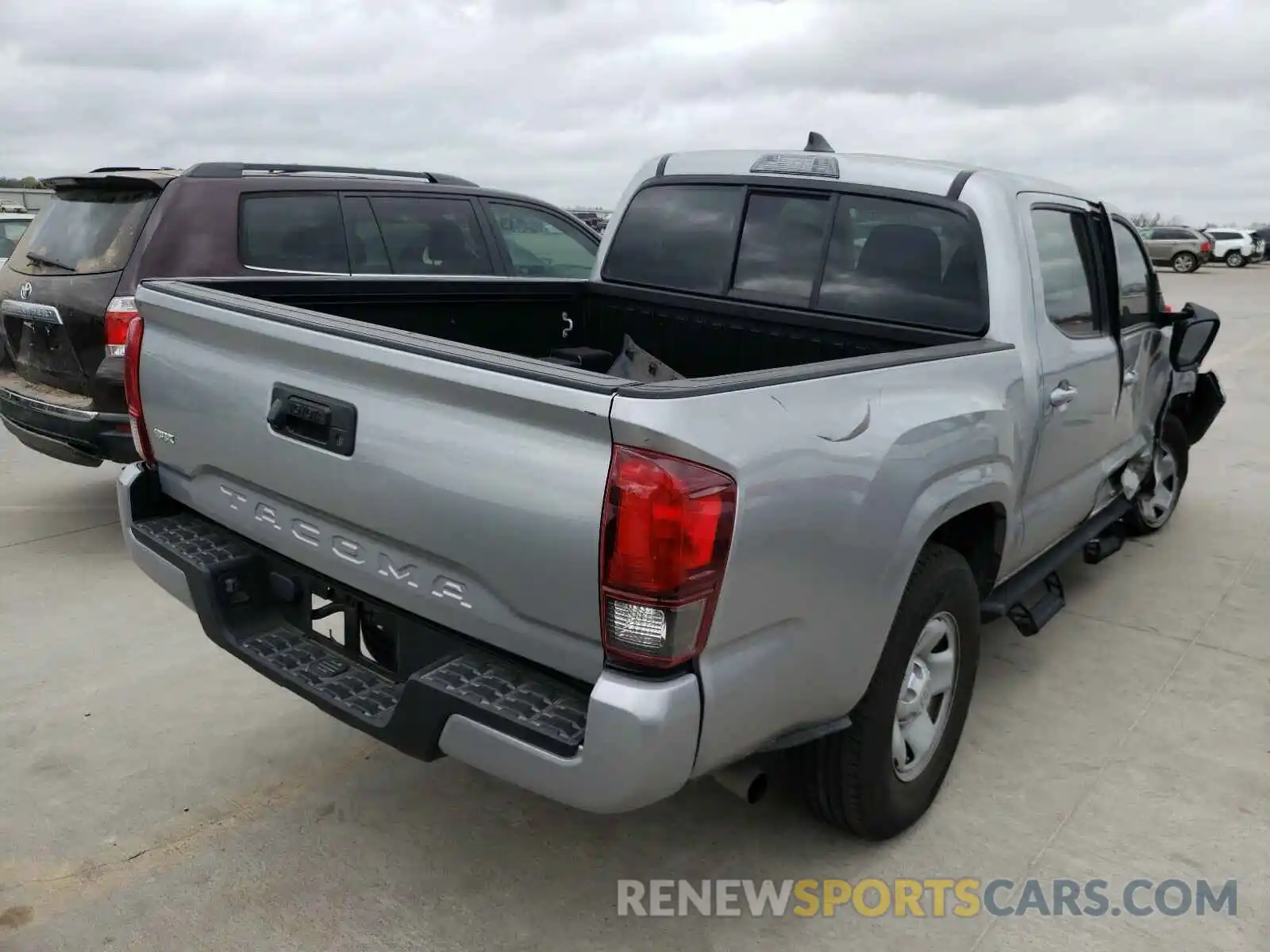 4 Photograph of a damaged car 5TFAX5GN5KX138206 TOYOTA TACOMA 2019