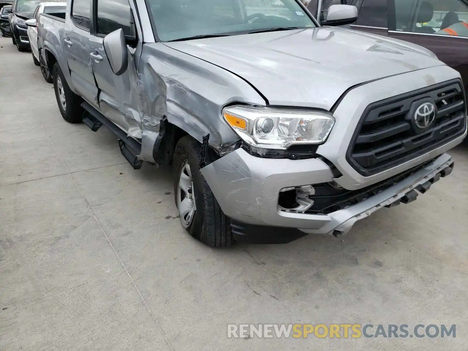 9 Photograph of a damaged car 5TFAX5GN5KX138206 TOYOTA TACOMA 2019