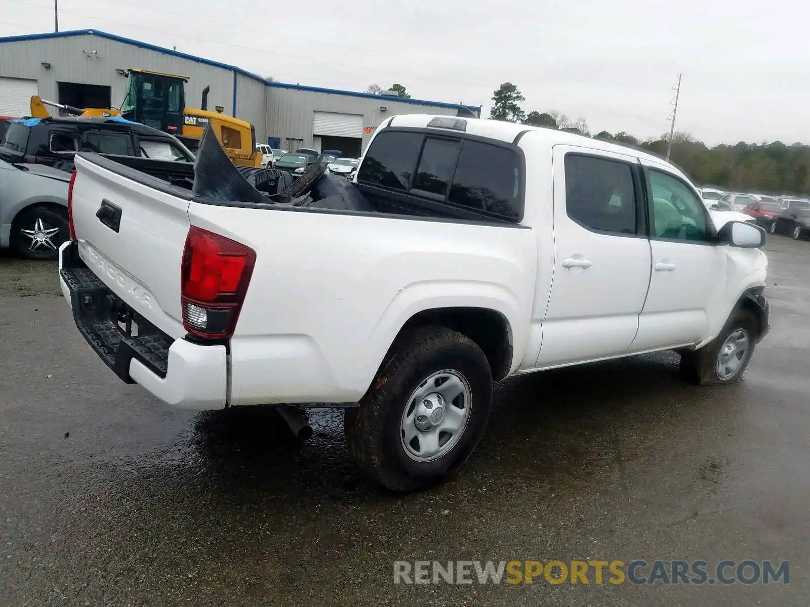 4 Photograph of a damaged car 5TFAX5GN5KX139131 TOYOTA TACOMA 2019