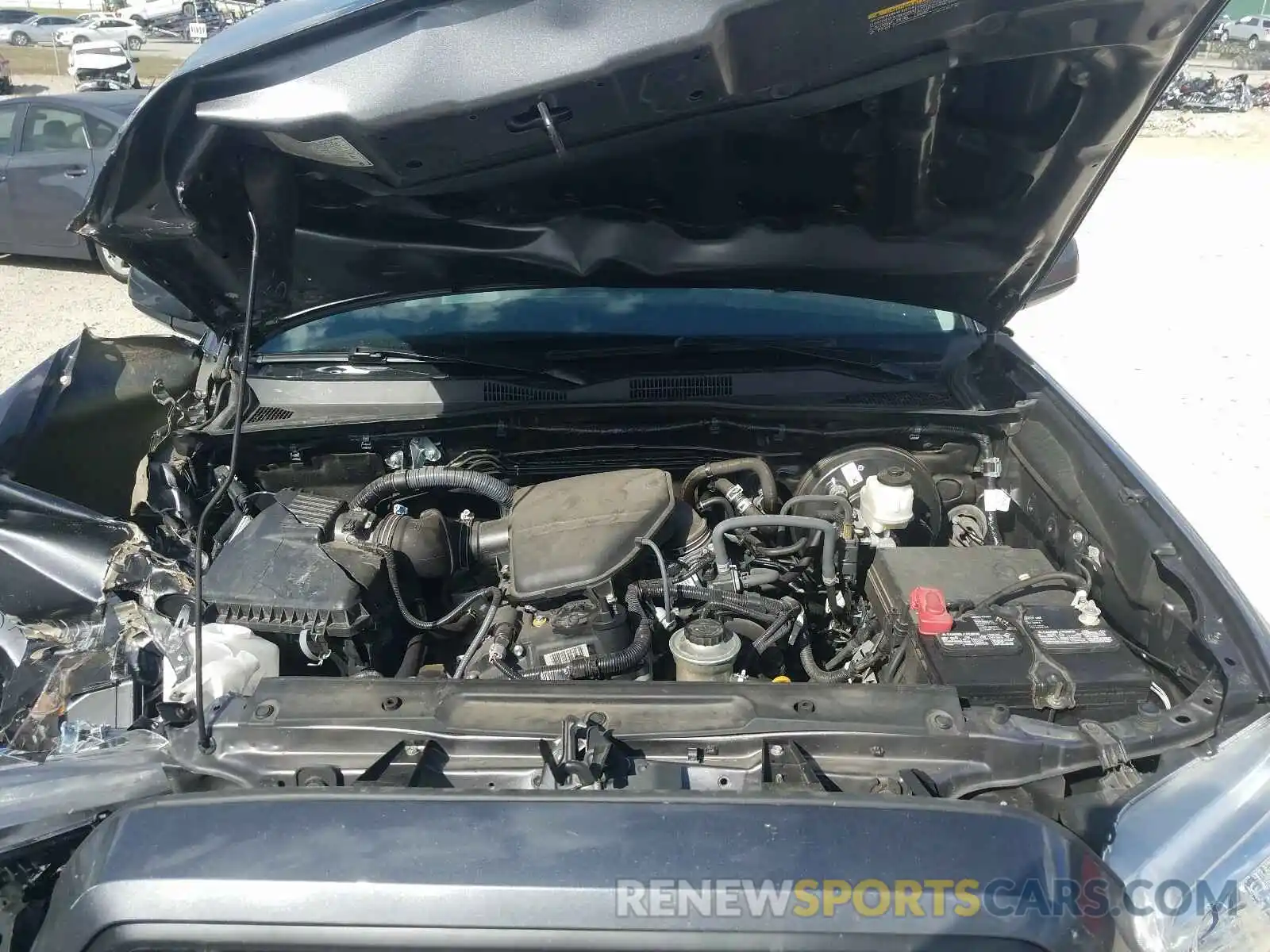 7 Photograph of a damaged car 5TFAX5GN5KX141848 TOYOTA TACOMA 2019