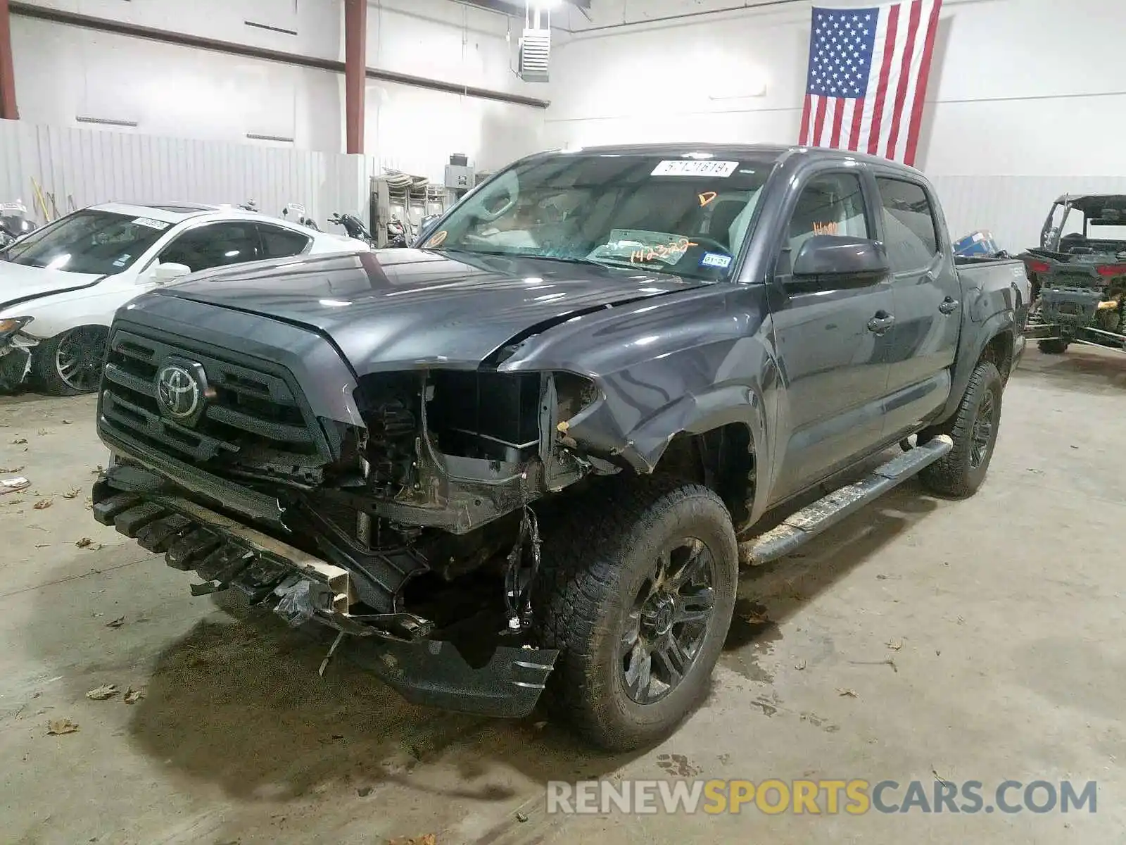 2 Photograph of a damaged car 5TFAX5GN5KX142322 TOYOTA TACOMA 2019