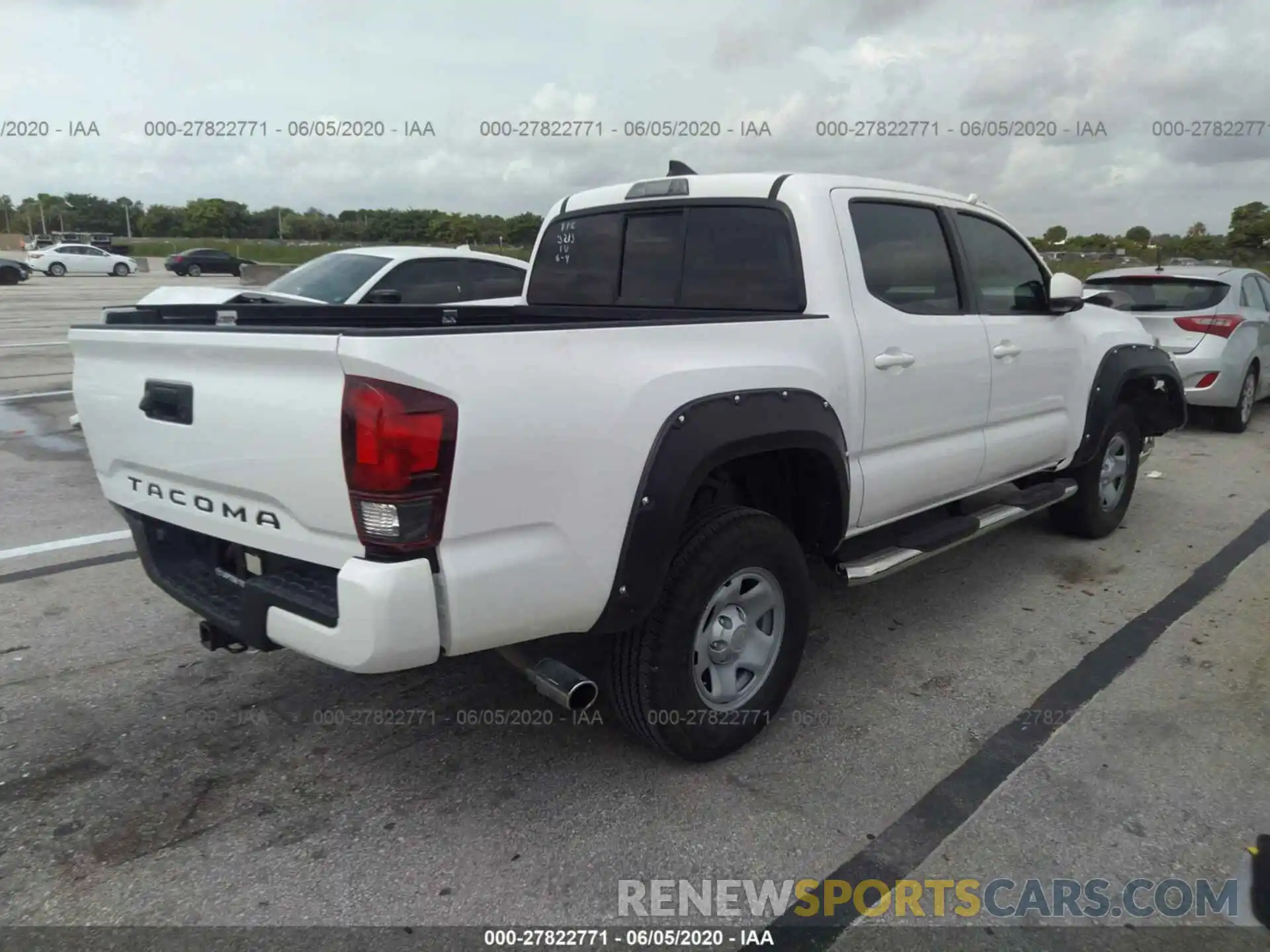 4 Photograph of a damaged car 5TFAX5GN5KX143213 TOYOTA TACOMA 2019