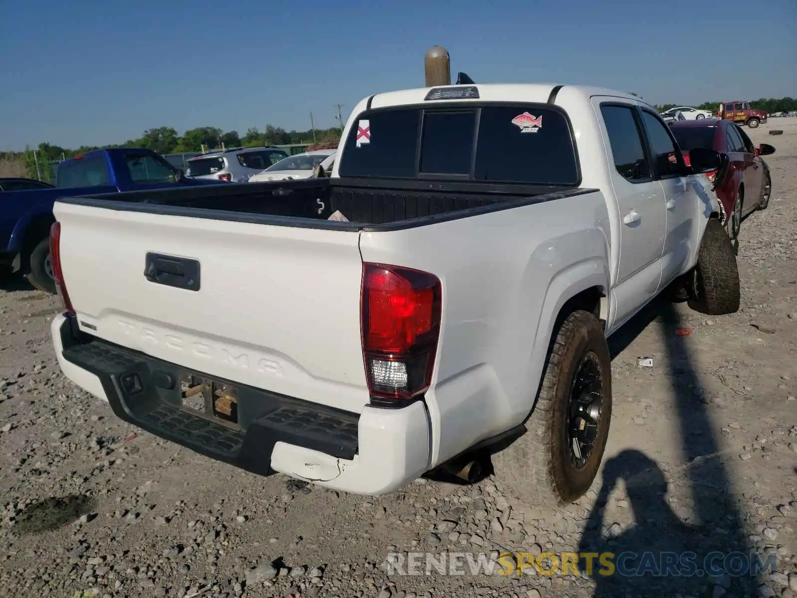 4 Photograph of a damaged car 5TFAX5GN5KX148704 TOYOTA TACOMA 2019