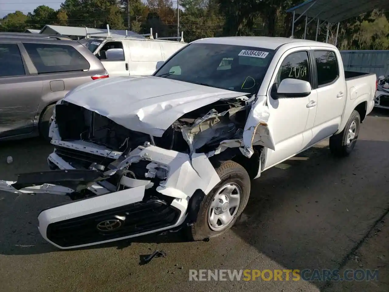 2 Photograph of a damaged car 5TFAX5GN5KX149772 TOYOTA TACOMA 2019