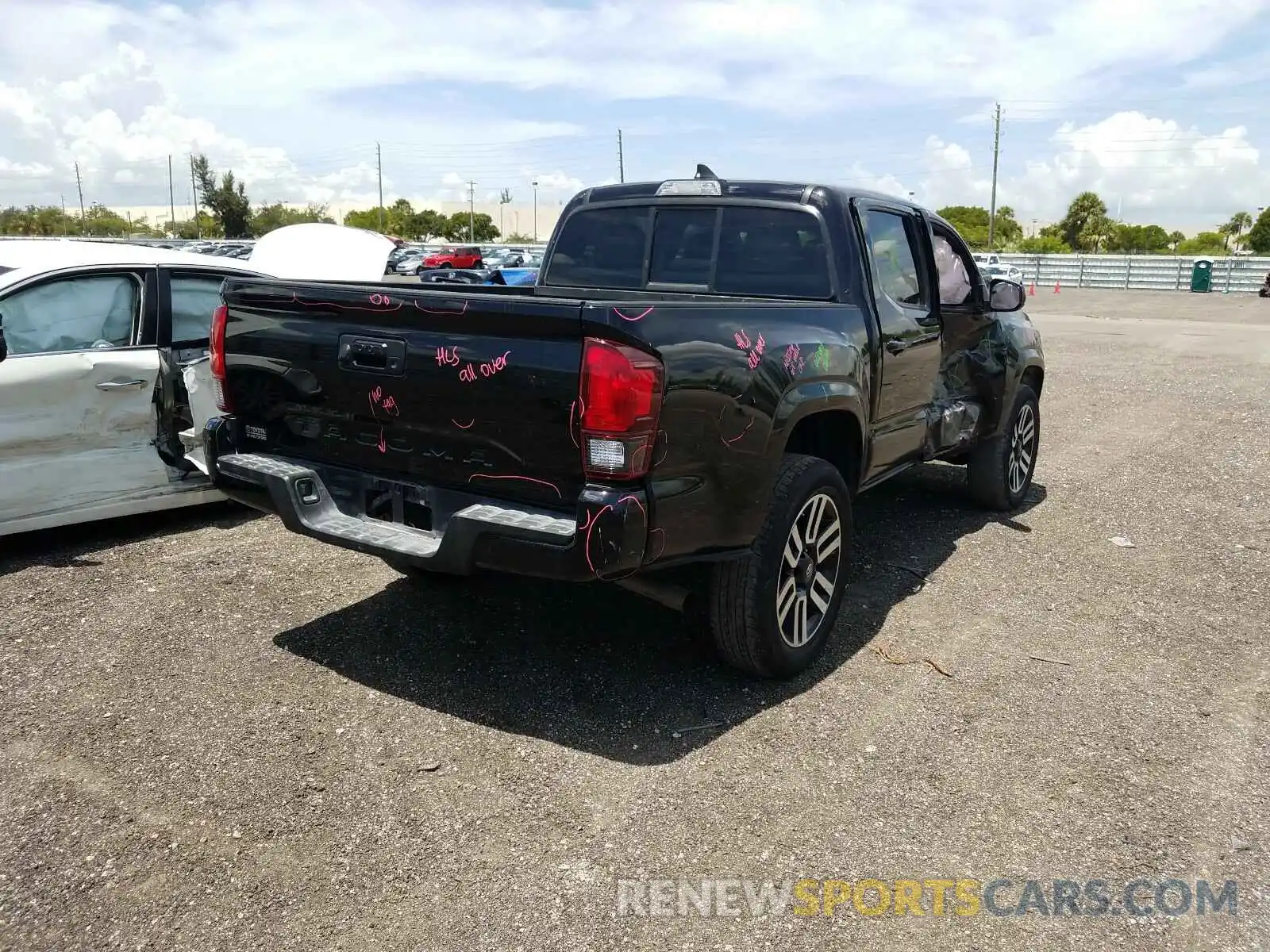 4 Photograph of a damaged car 5TFAX5GN5KX151201 TOYOTA TACOMA 2019