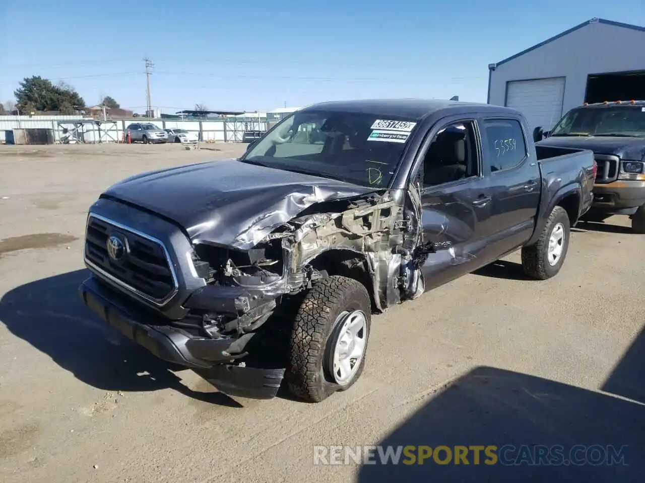 2 Photograph of a damaged car 5TFAX5GN5KX152560 TOYOTA TACOMA 2019