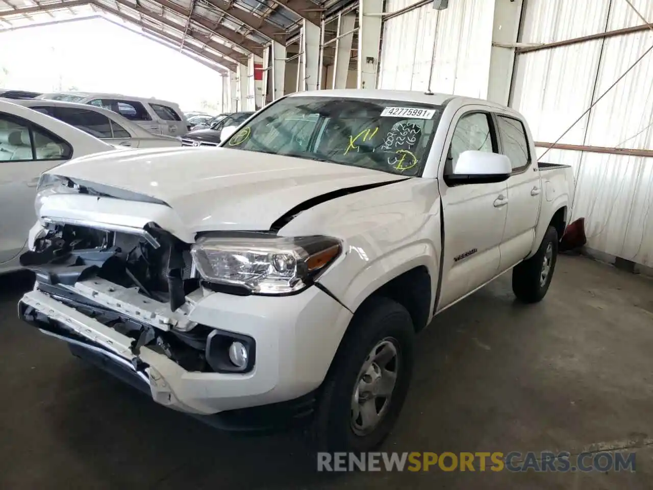 2 Photograph of a damaged car 5TFAX5GN5KX157998 TOYOTA TACOMA 2019