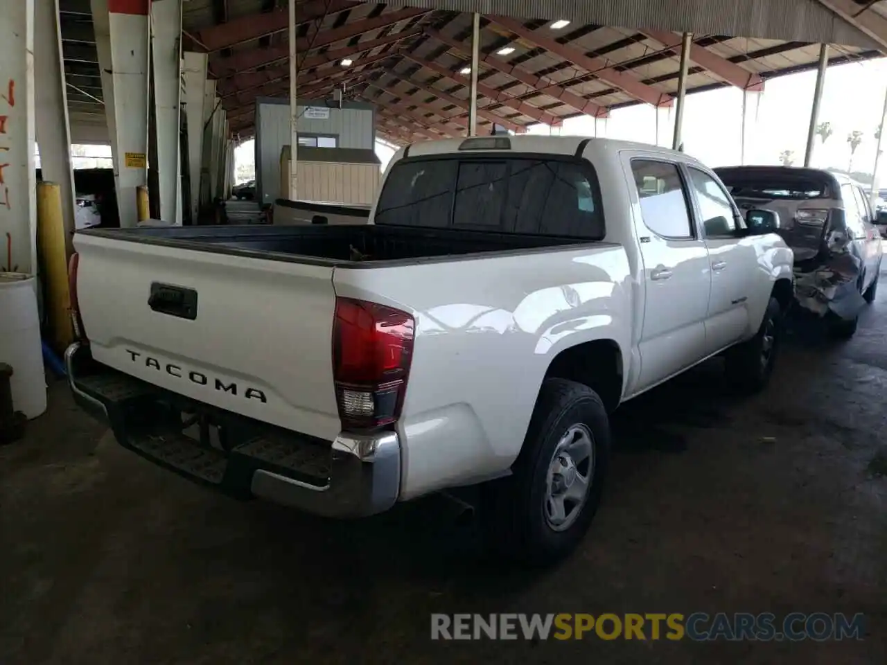 4 Photograph of a damaged car 5TFAX5GN5KX157998 TOYOTA TACOMA 2019