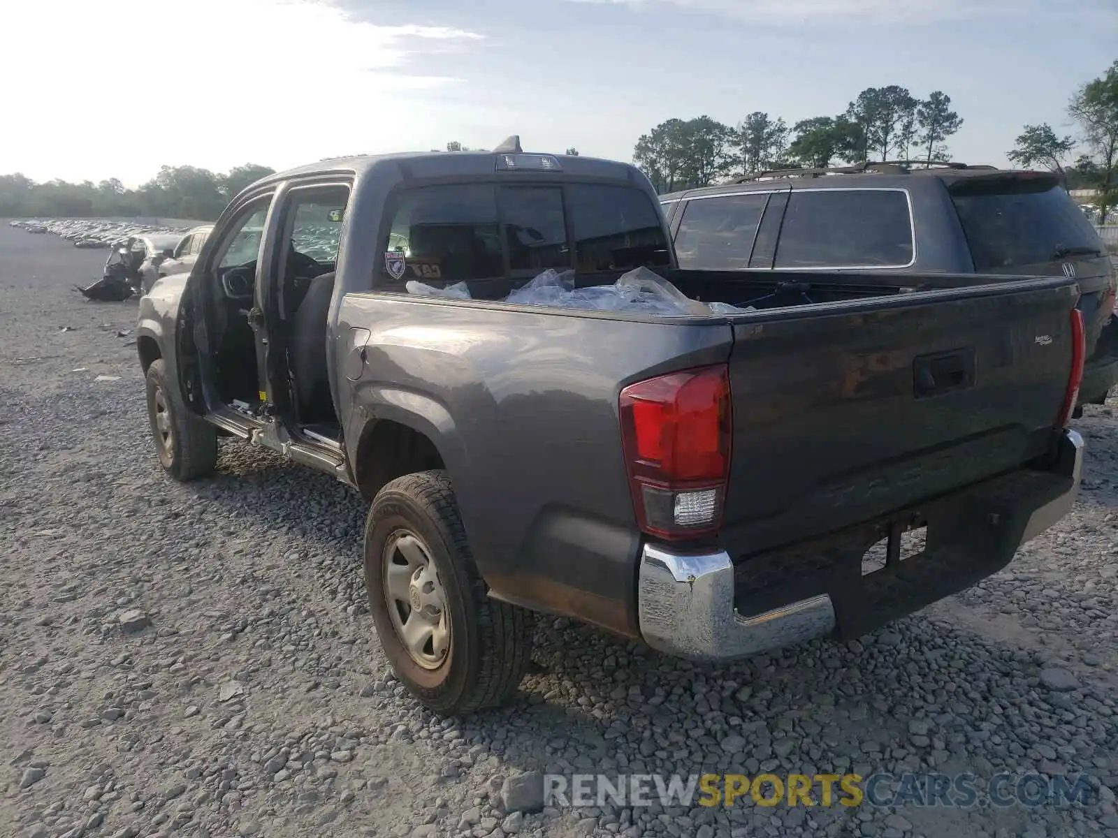 3 Photograph of a damaged car 5TFAX5GN5KX158956 TOYOTA TACOMA 2019