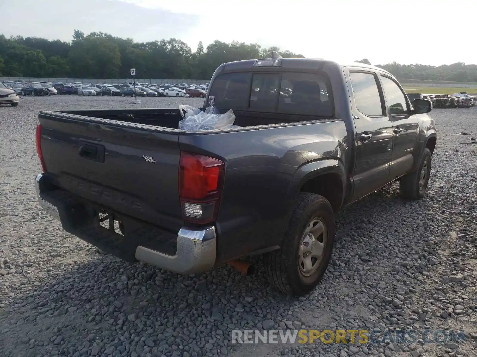 4 Photograph of a damaged car 5TFAX5GN5KX158956 TOYOTA TACOMA 2019