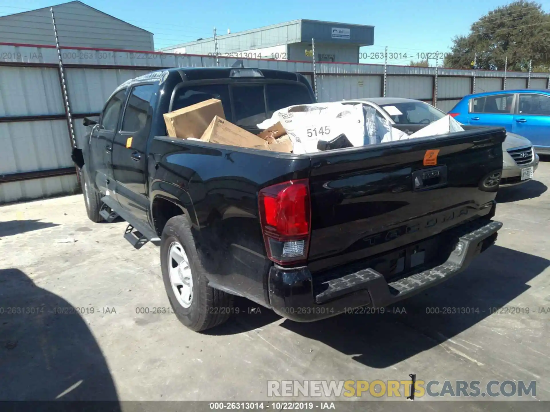 3 Photograph of a damaged car 5TFAX5GN6KX135900 TOYOTA TACOMA 2019