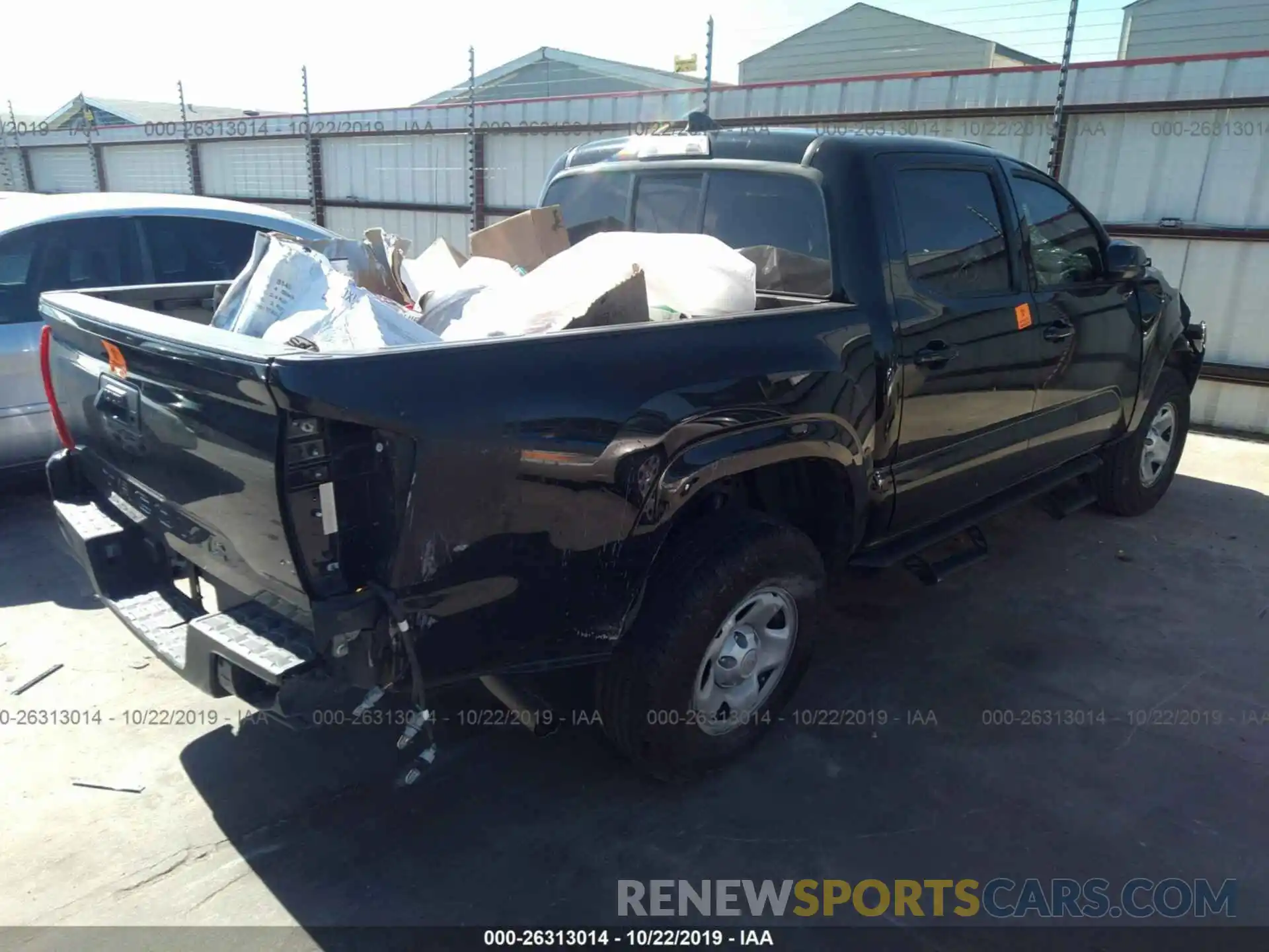 4 Photograph of a damaged car 5TFAX5GN6KX135900 TOYOTA TACOMA 2019