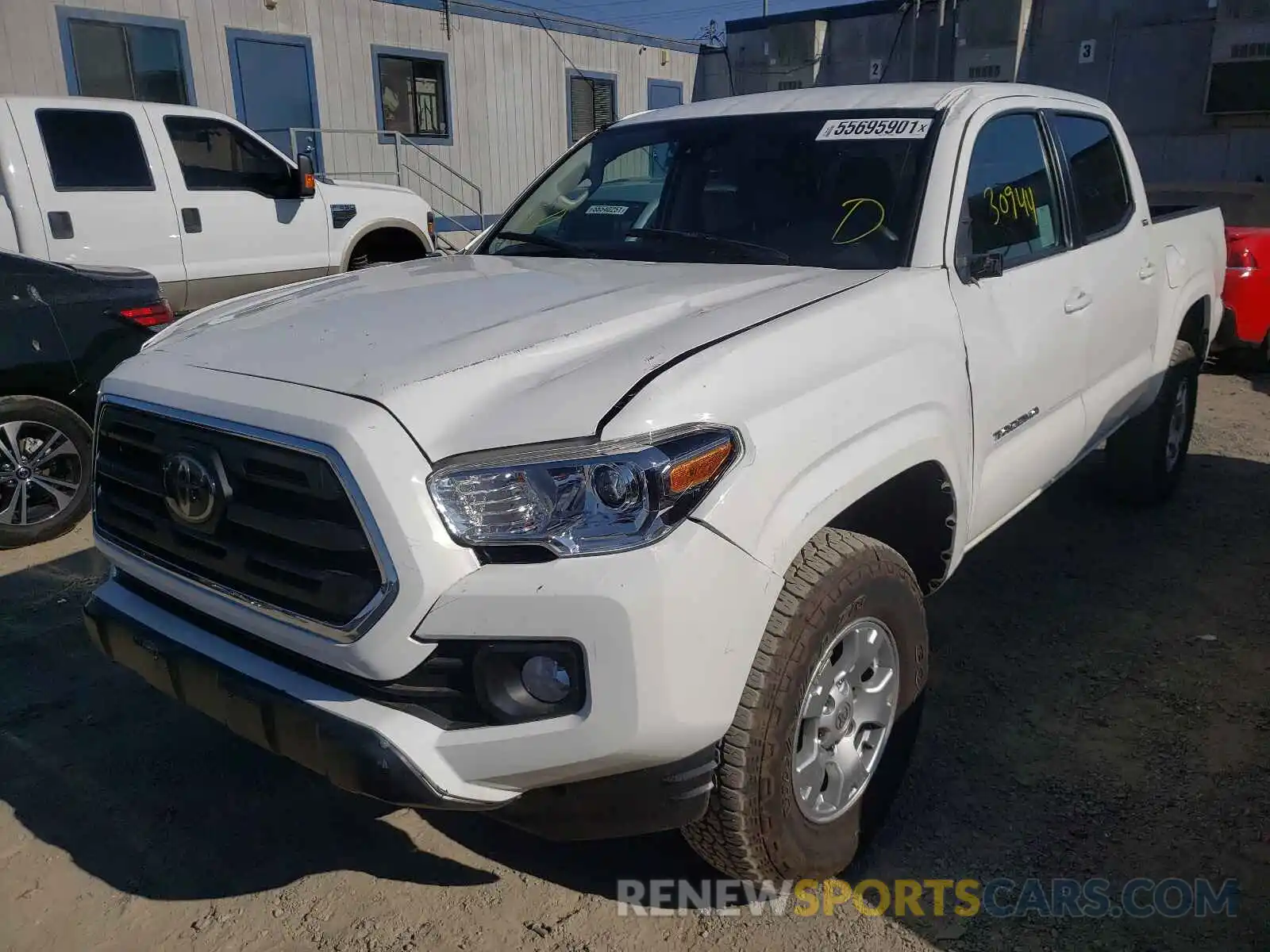 2 Photograph of a damaged car 5TFAX5GN6KX137386 TOYOTA TACOMA 2019