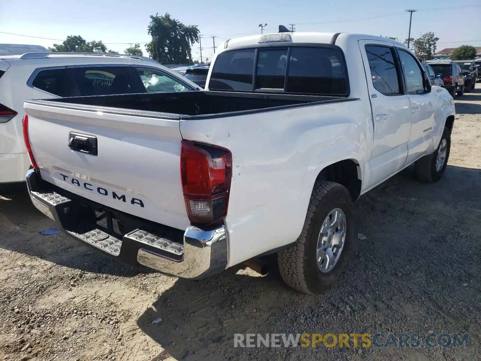 4 Photograph of a damaged car 5TFAX5GN6KX137386 TOYOTA TACOMA 2019