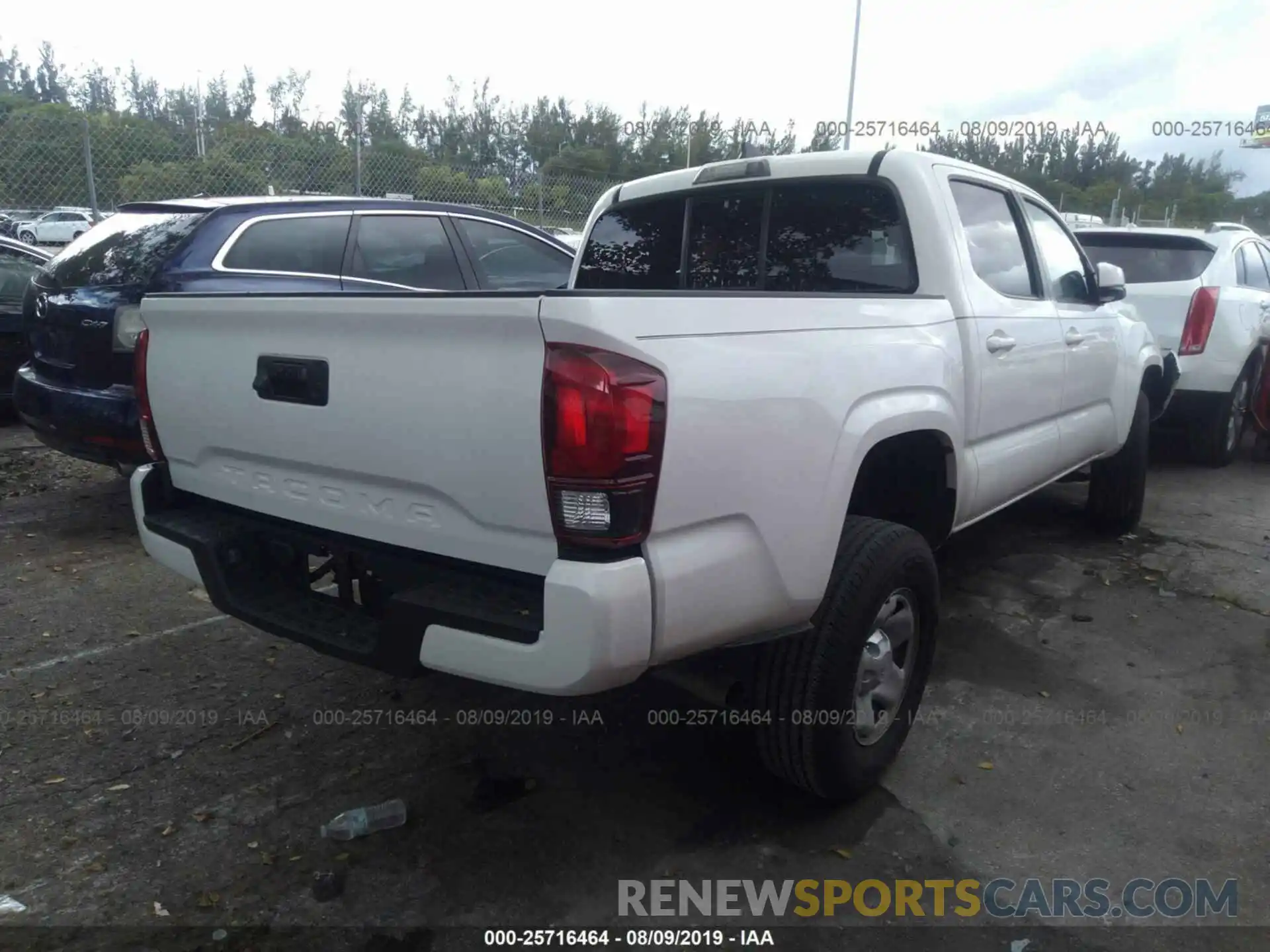 4 Photograph of a damaged car 5TFAX5GN6KX139767 TOYOTA TACOMA 2019