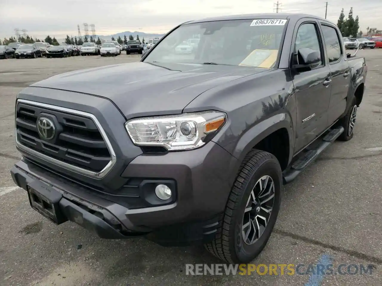 2 Photograph of a damaged car 5TFAX5GN6KX141566 TOYOTA TACOMA 2019