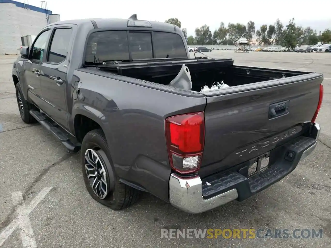 3 Photograph of a damaged car 5TFAX5GN6KX141566 TOYOTA TACOMA 2019