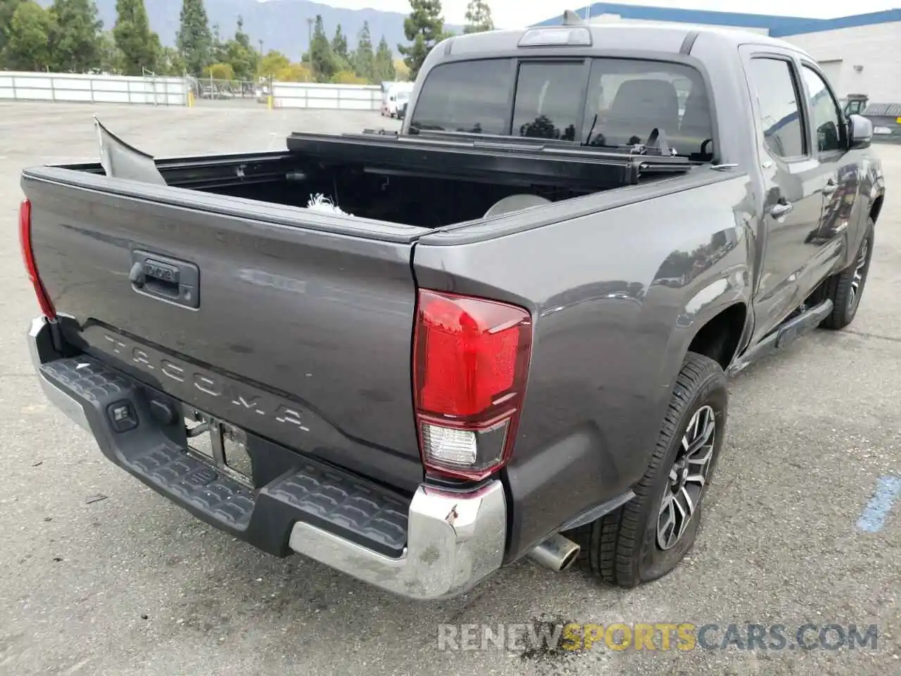 4 Photograph of a damaged car 5TFAX5GN6KX141566 TOYOTA TACOMA 2019