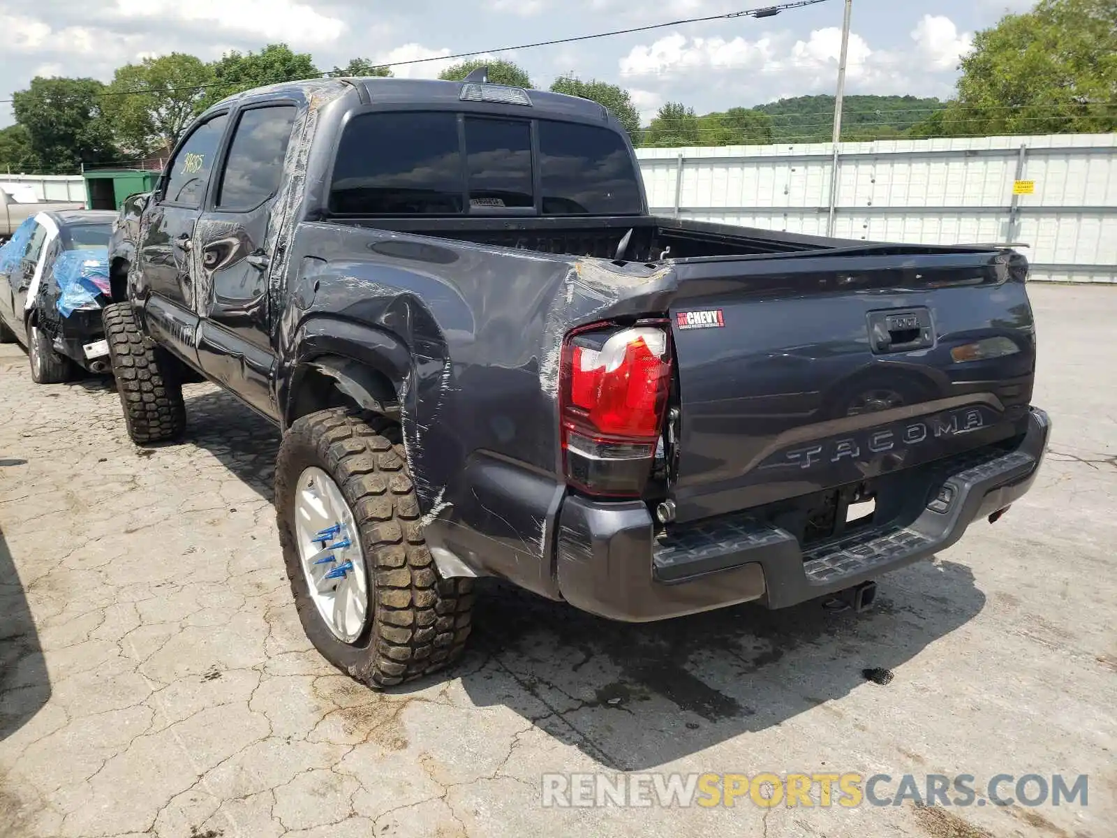 3 Photograph of a damaged car 5TFAX5GN6KX141924 TOYOTA TACOMA 2019