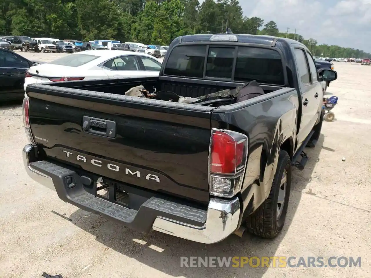 4 Photograph of a damaged car 5TFAX5GN6KX147111 TOYOTA TACOMA 2019