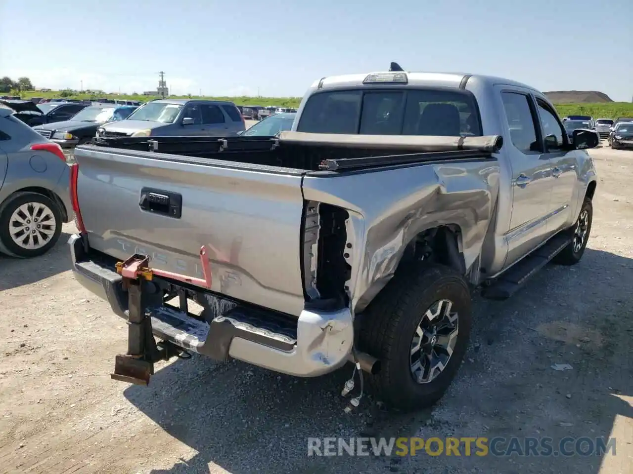 4 Photograph of a damaged car 5TFAX5GN6KX147299 TOYOTA TACOMA 2019