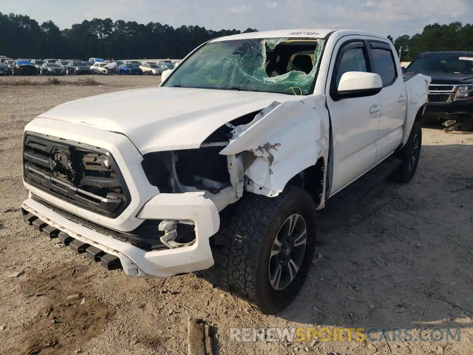 2 Photograph of a damaged car 5TFAX5GN6KX149392 TOYOTA TACOMA 2019