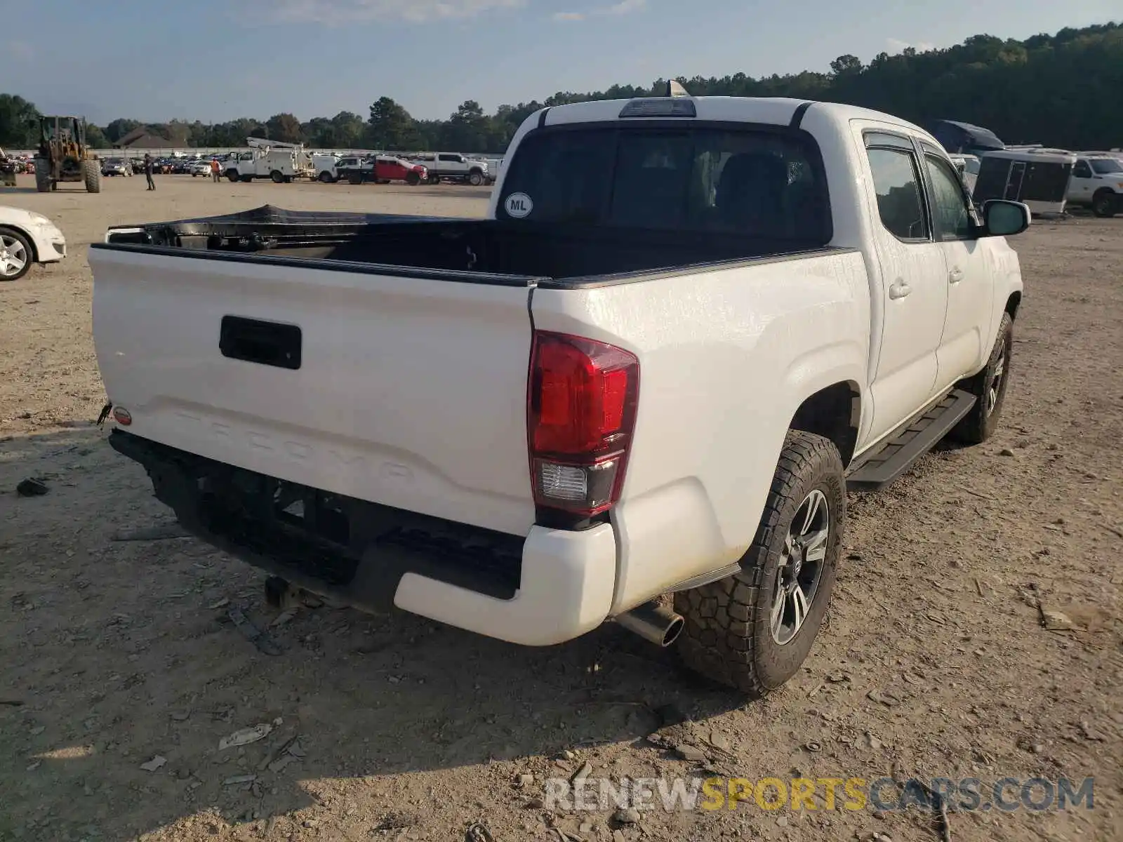 4 Photograph of a damaged car 5TFAX5GN6KX149392 TOYOTA TACOMA 2019