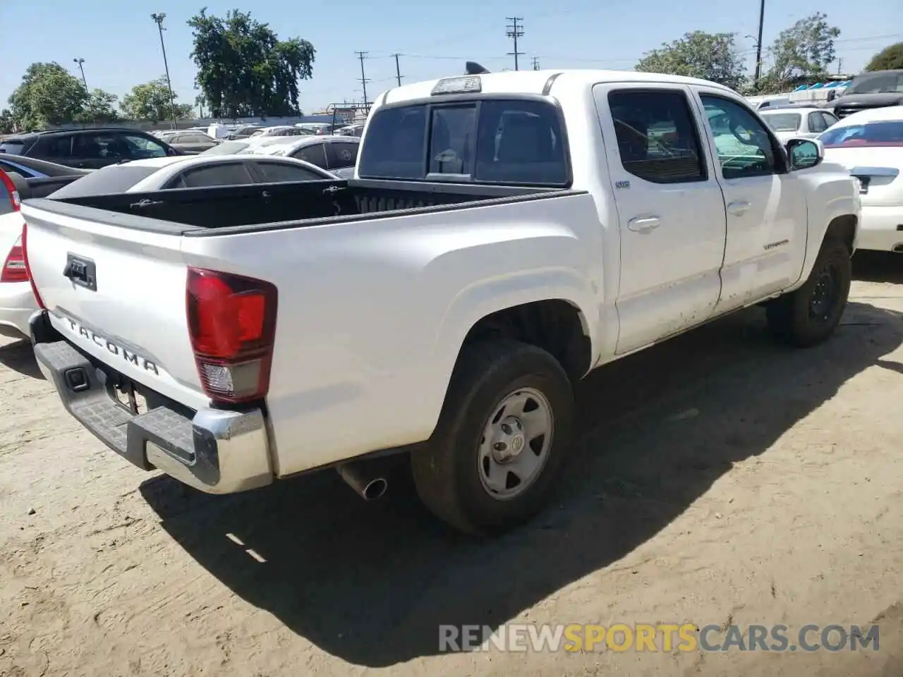 4 Photograph of a damaged car 5TFAX5GN6KX153636 TOYOTA TACOMA 2019