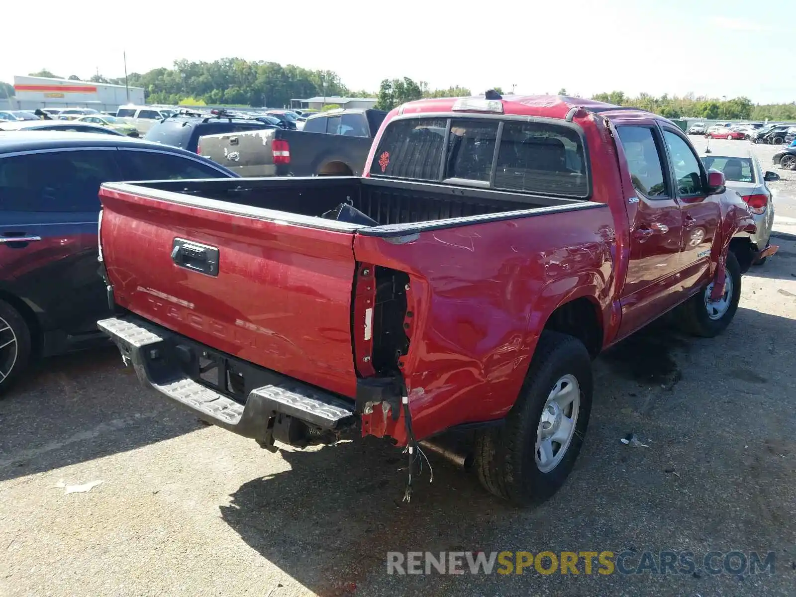 4 Photograph of a damaged car 5TFAX5GN6KX153958 TOYOTA TACOMA 2019