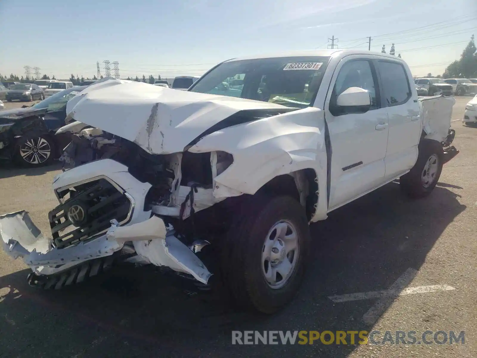 2 Photograph of a damaged car 5TFAX5GN6KX156620 TOYOTA TACOMA 2019