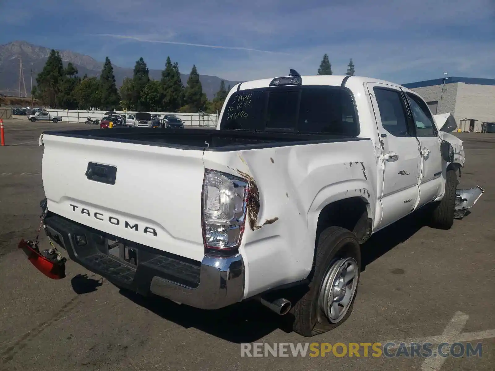 4 Photograph of a damaged car 5TFAX5GN6KX156620 TOYOTA TACOMA 2019