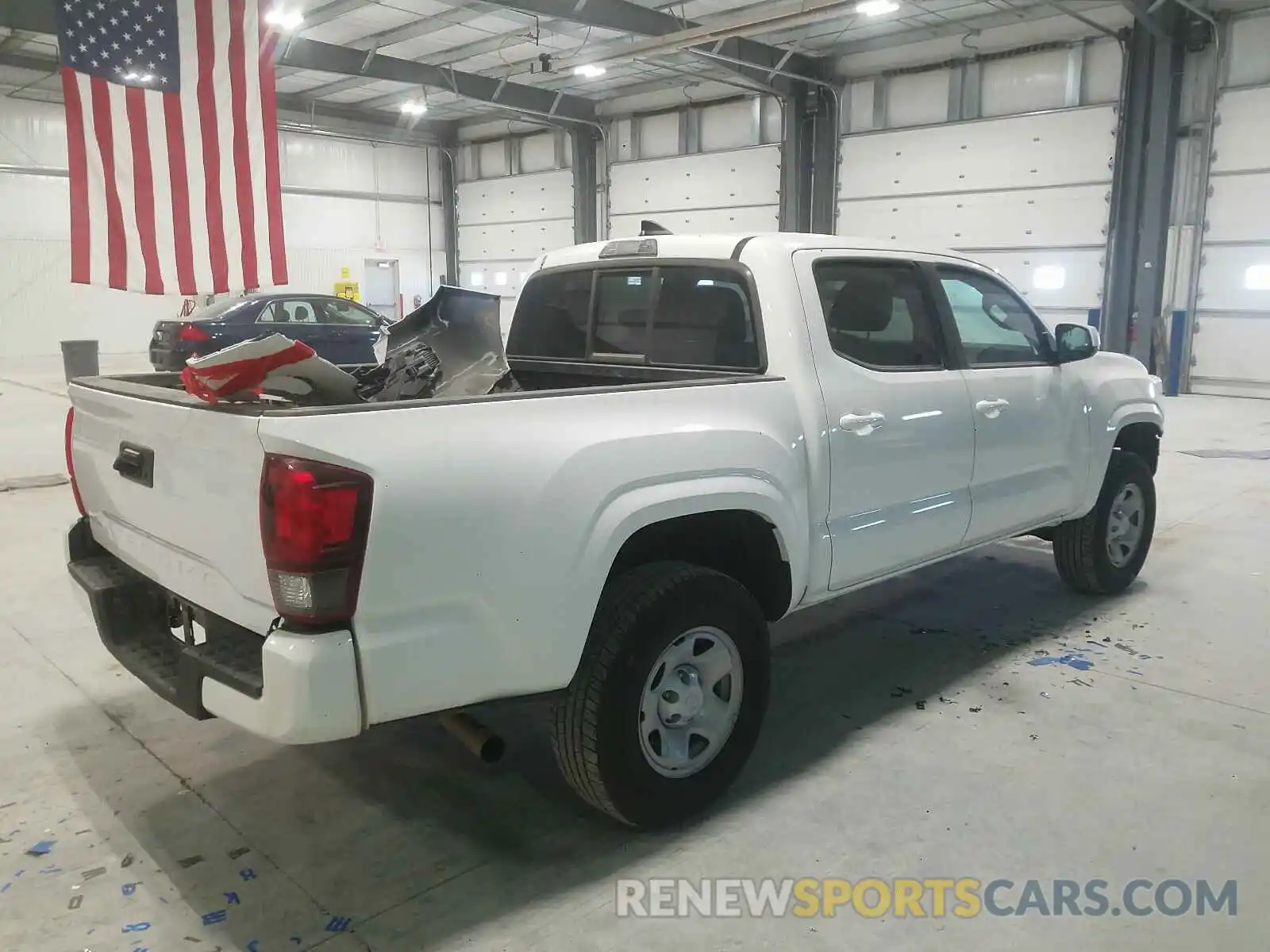 4 Photograph of a damaged car 5TFAX5GN6KX165169 TOYOTA TACOMA 2019