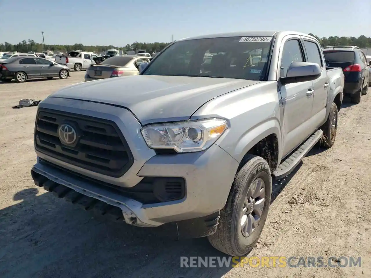 2 Photograph of a damaged car 5TFAX5GN7KX133217 TOYOTA TACOMA 2019