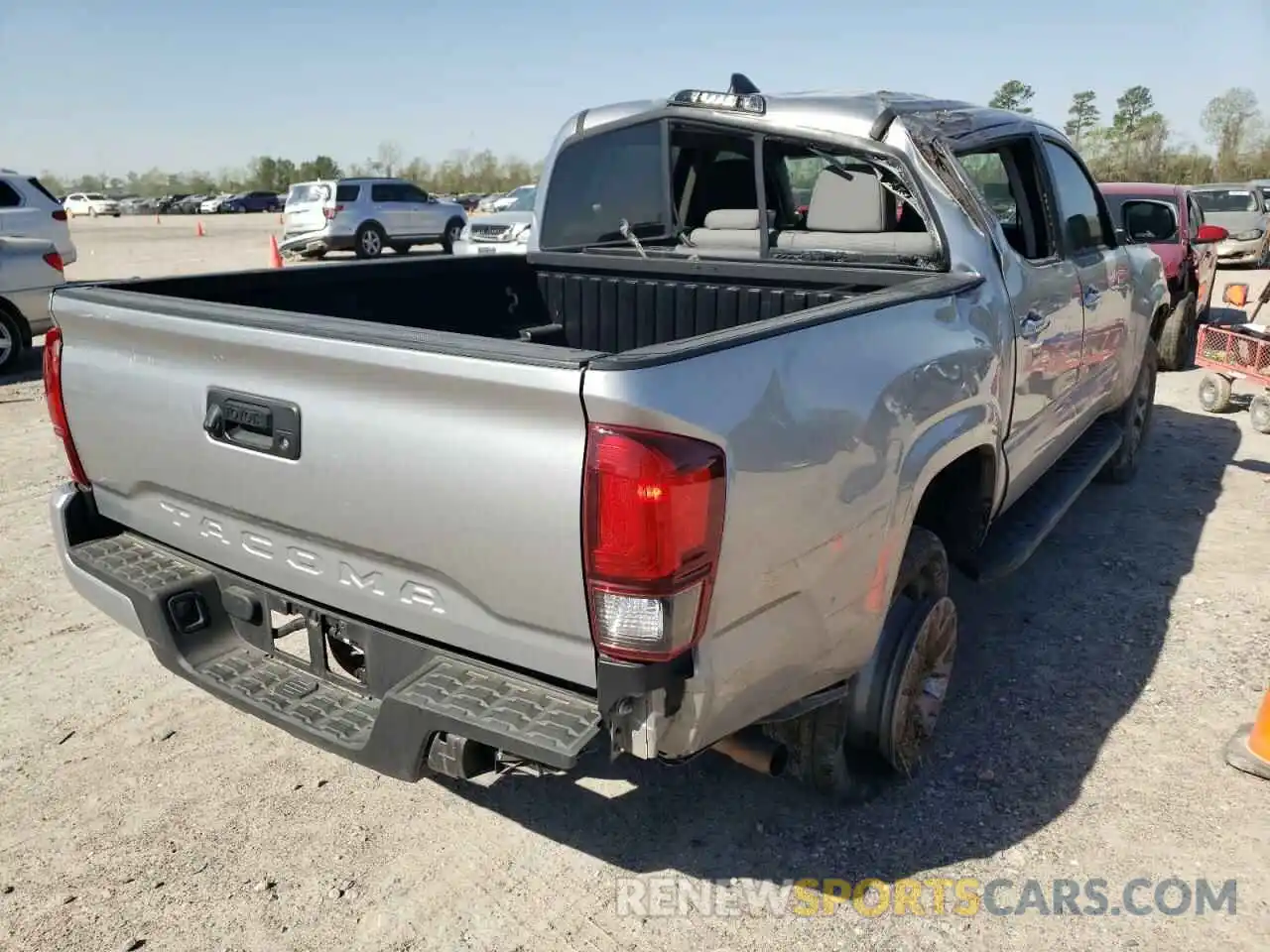 4 Photograph of a damaged car 5TFAX5GN7KX133217 TOYOTA TACOMA 2019