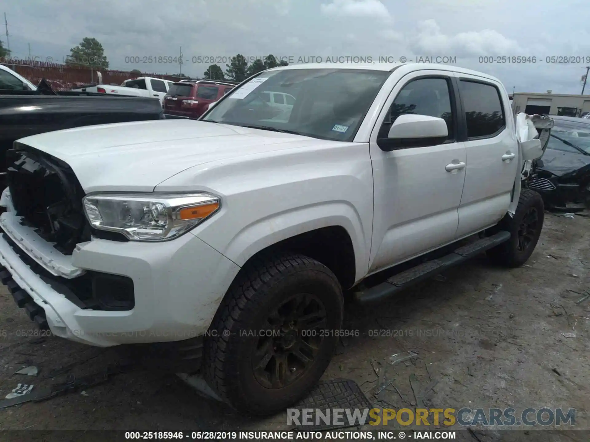 2 Photograph of a damaged car 5TFAX5GN7KX133525 TOYOTA TACOMA 2019