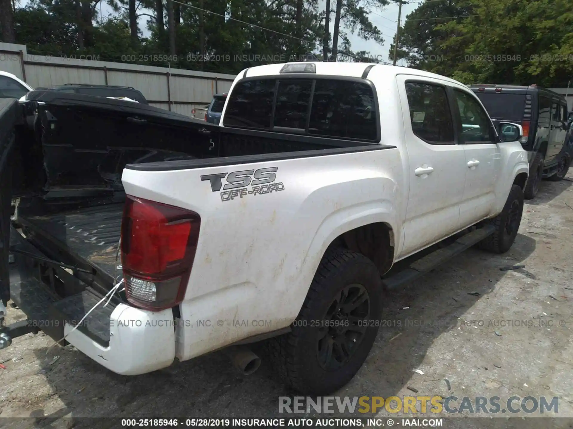 4 Photograph of a damaged car 5TFAX5GN7KX133525 TOYOTA TACOMA 2019