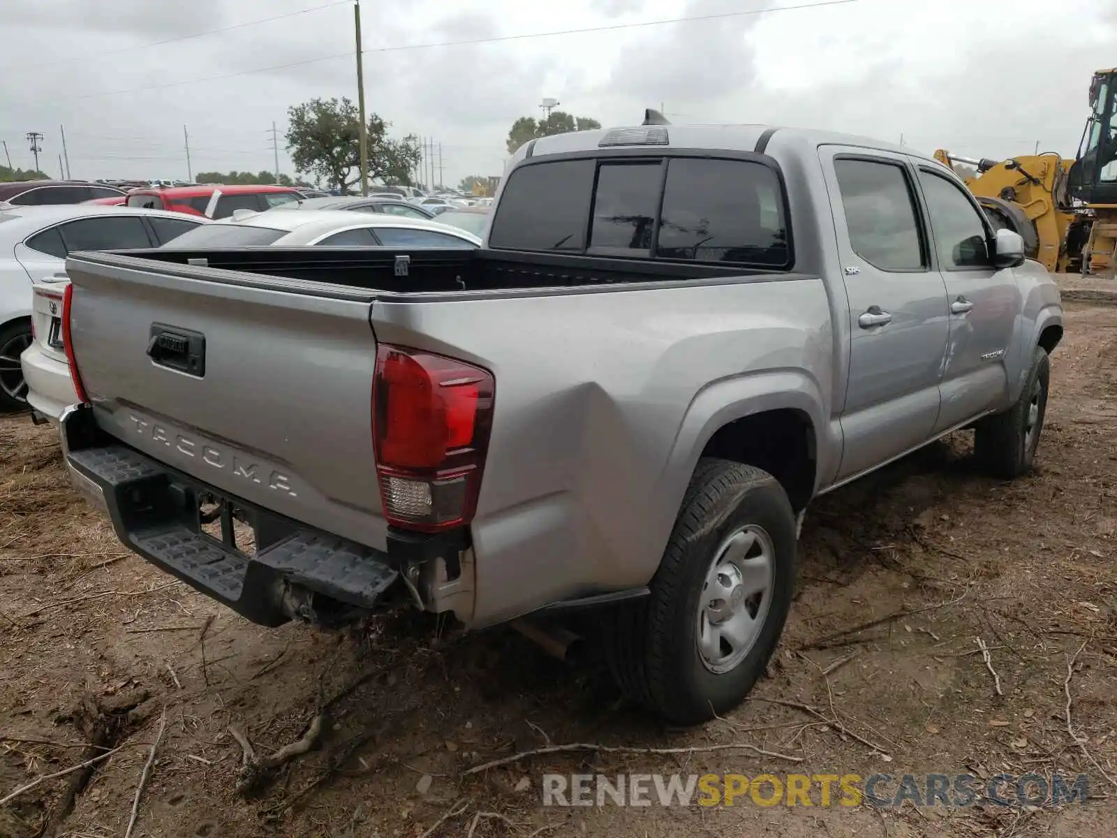 4 Photograph of a damaged car 5TFAX5GN7KX133878 TOYOTA TACOMA 2019