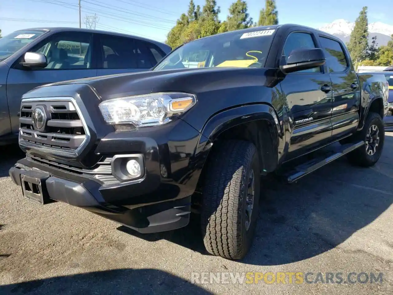 2 Photograph of a damaged car 5TFAX5GN7KX133959 TOYOTA TACOMA 2019