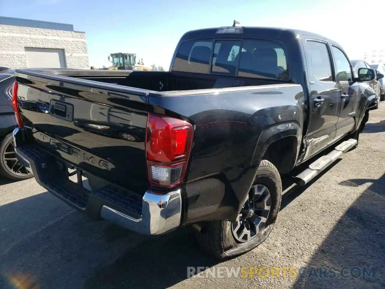 4 Photograph of a damaged car 5TFAX5GN7KX133959 TOYOTA TACOMA 2019