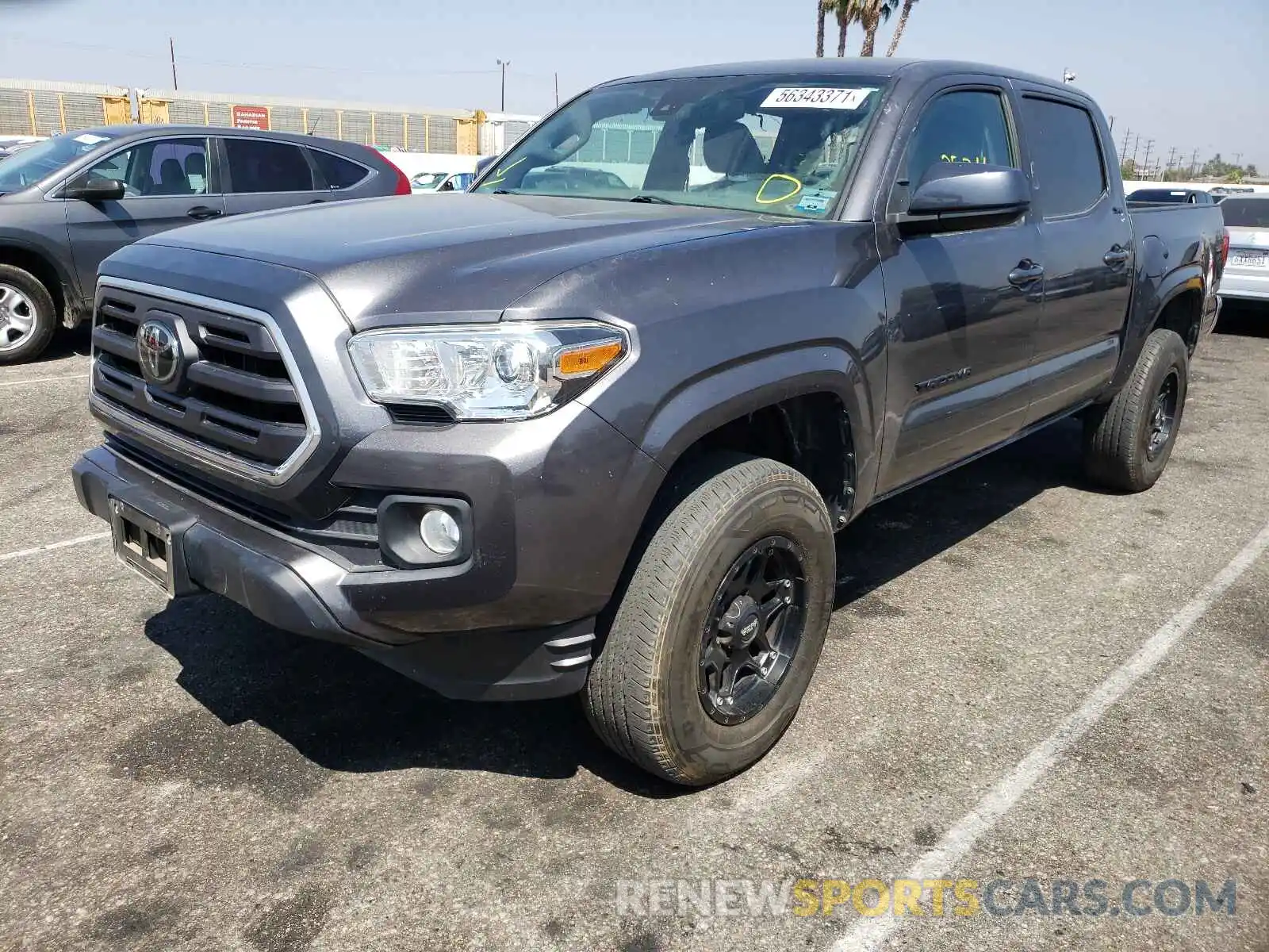 2 Photograph of a damaged car 5TFAX5GN7KX135906 TOYOTA TACOMA 2019